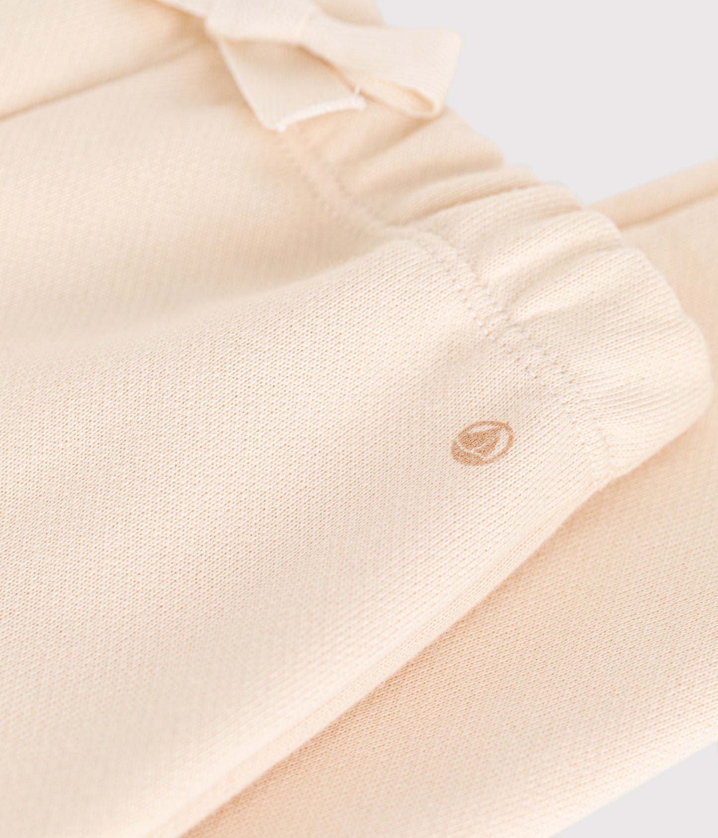 Joggingbukser i ensfarvet bomuld til baby - råhvide