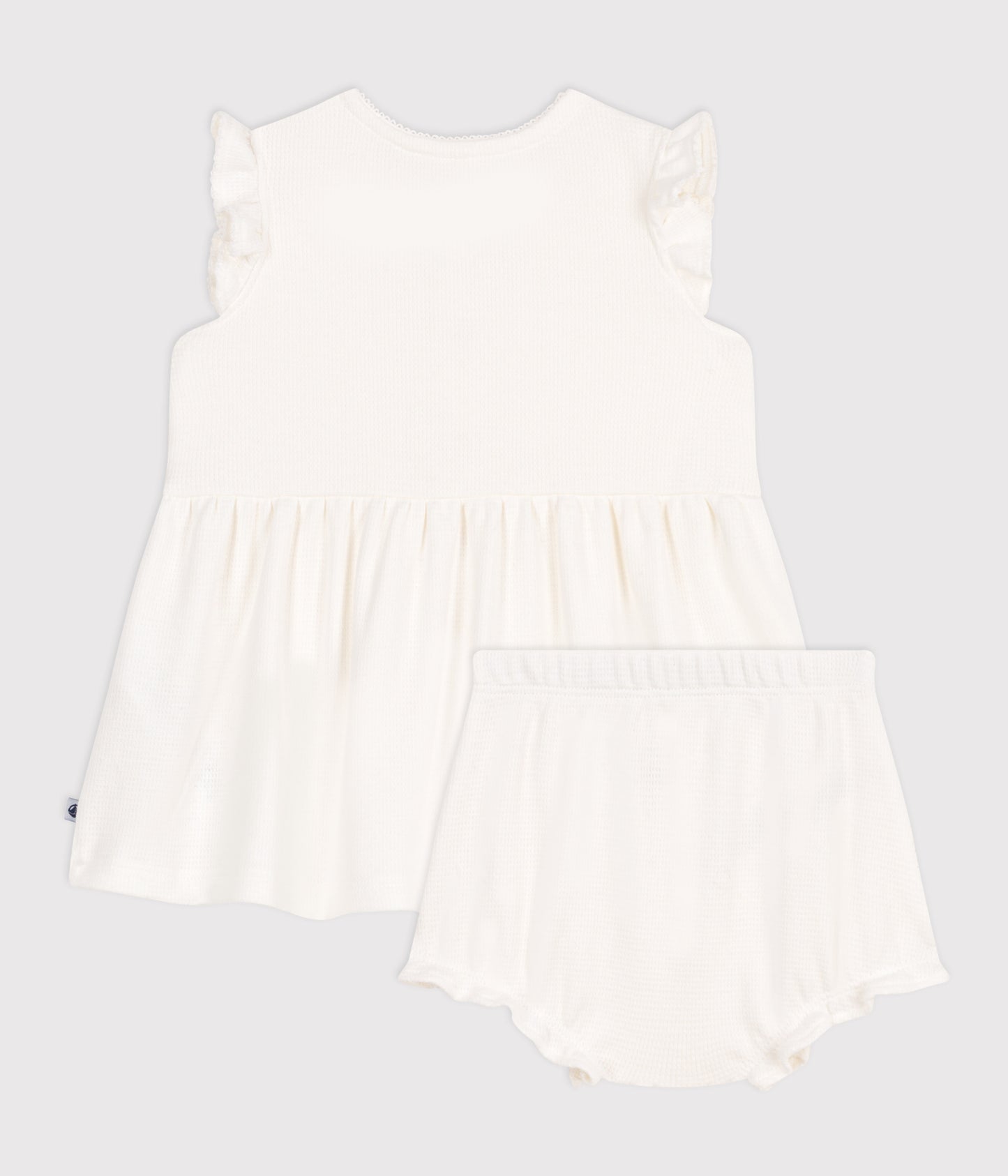 Kortærmet hvid honeycomb-kjole og bloomers til babyer