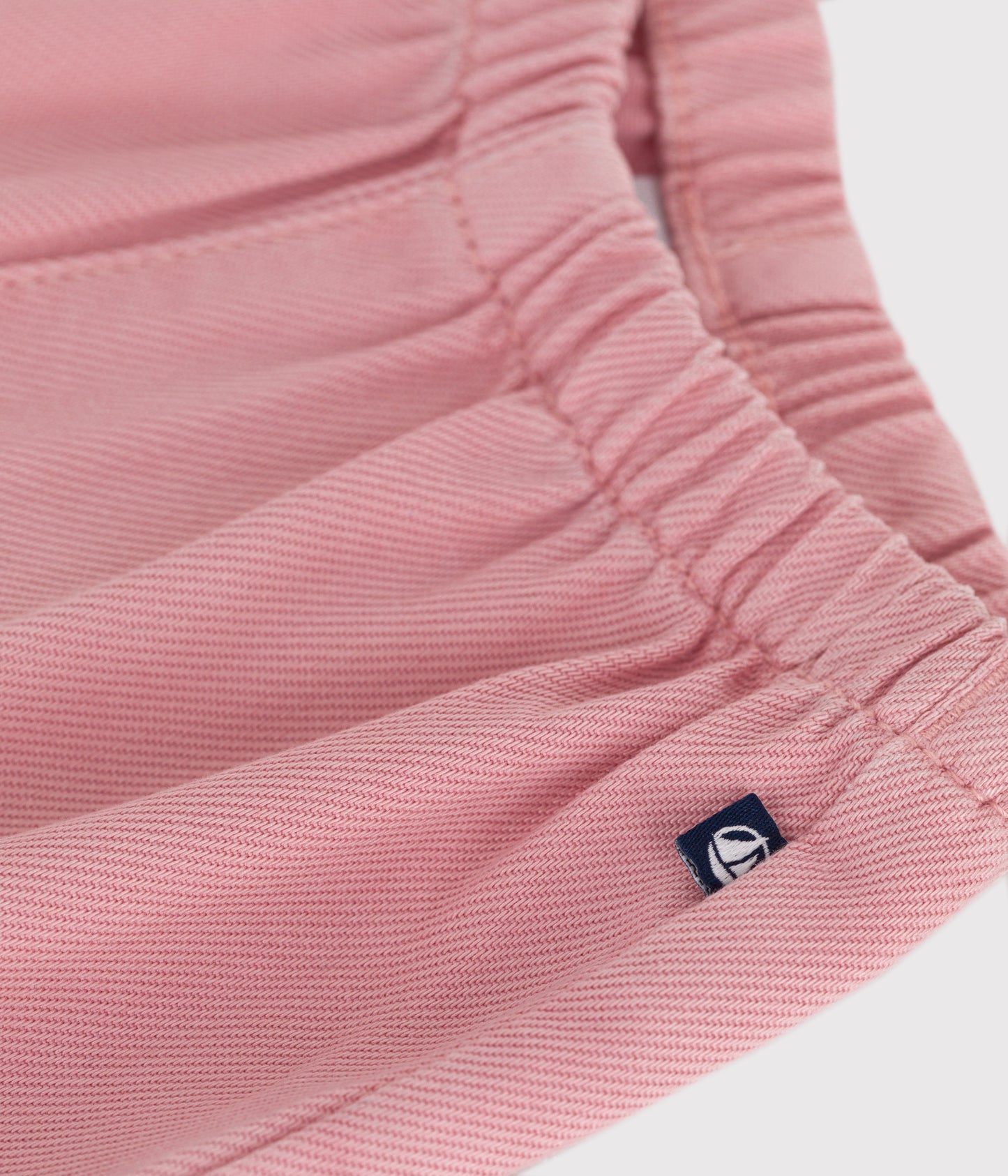 Bukser i blød lyserød bomuld til baby