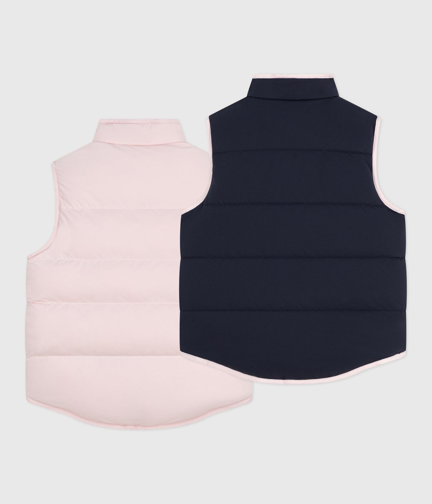 Vendbar dunvest til børn i lyserød/mørkeblå