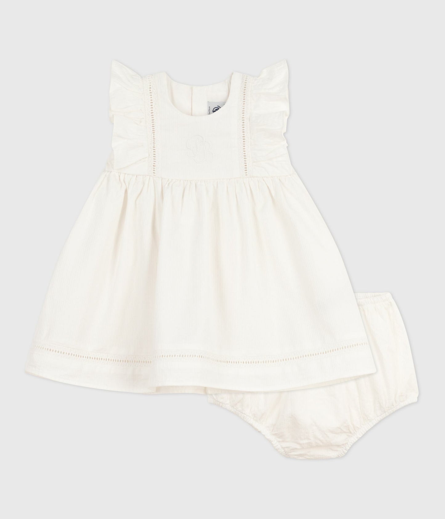 Hvid broderede bomuldskjole med matchende bloomers til baby