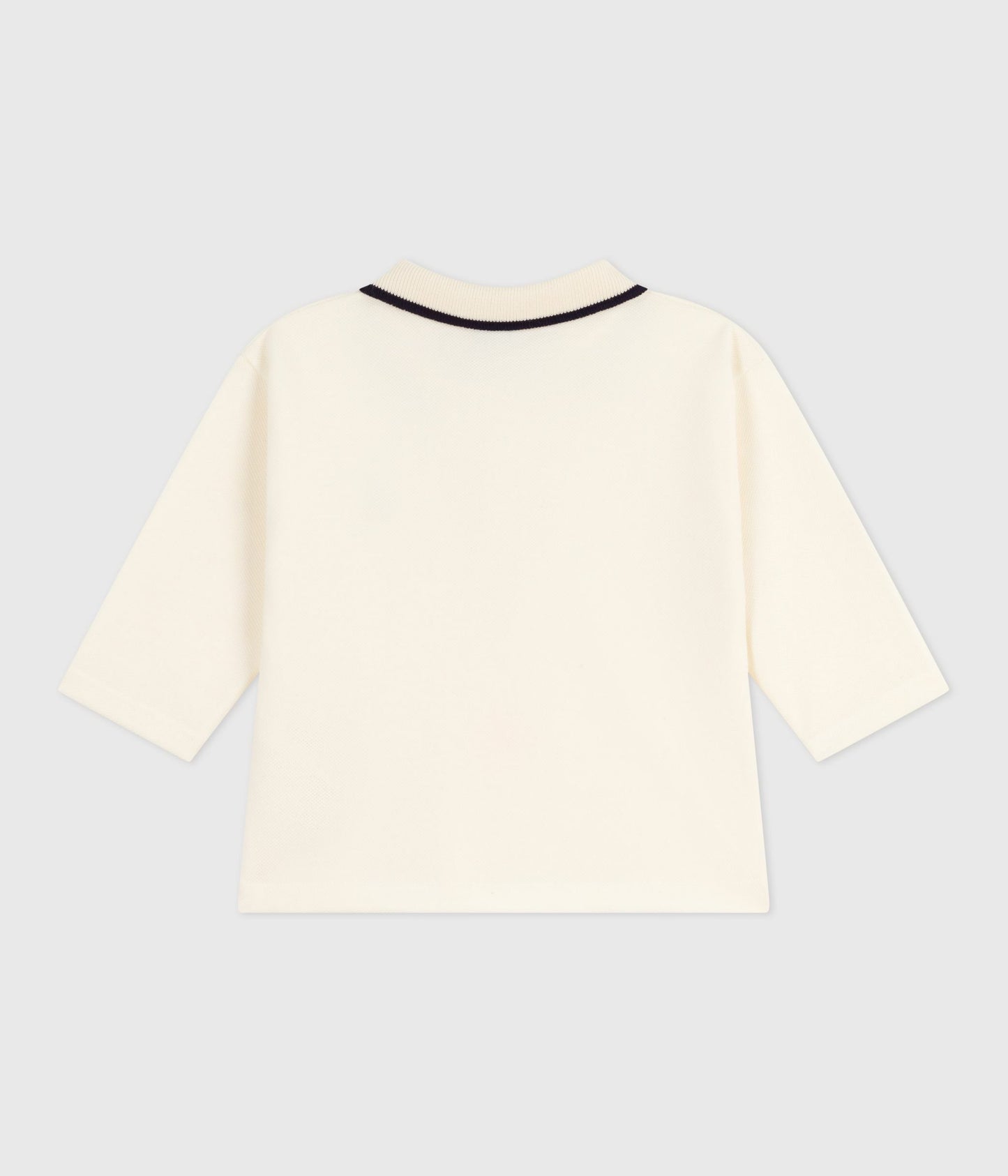 Langærmet polo til baby i råhvid