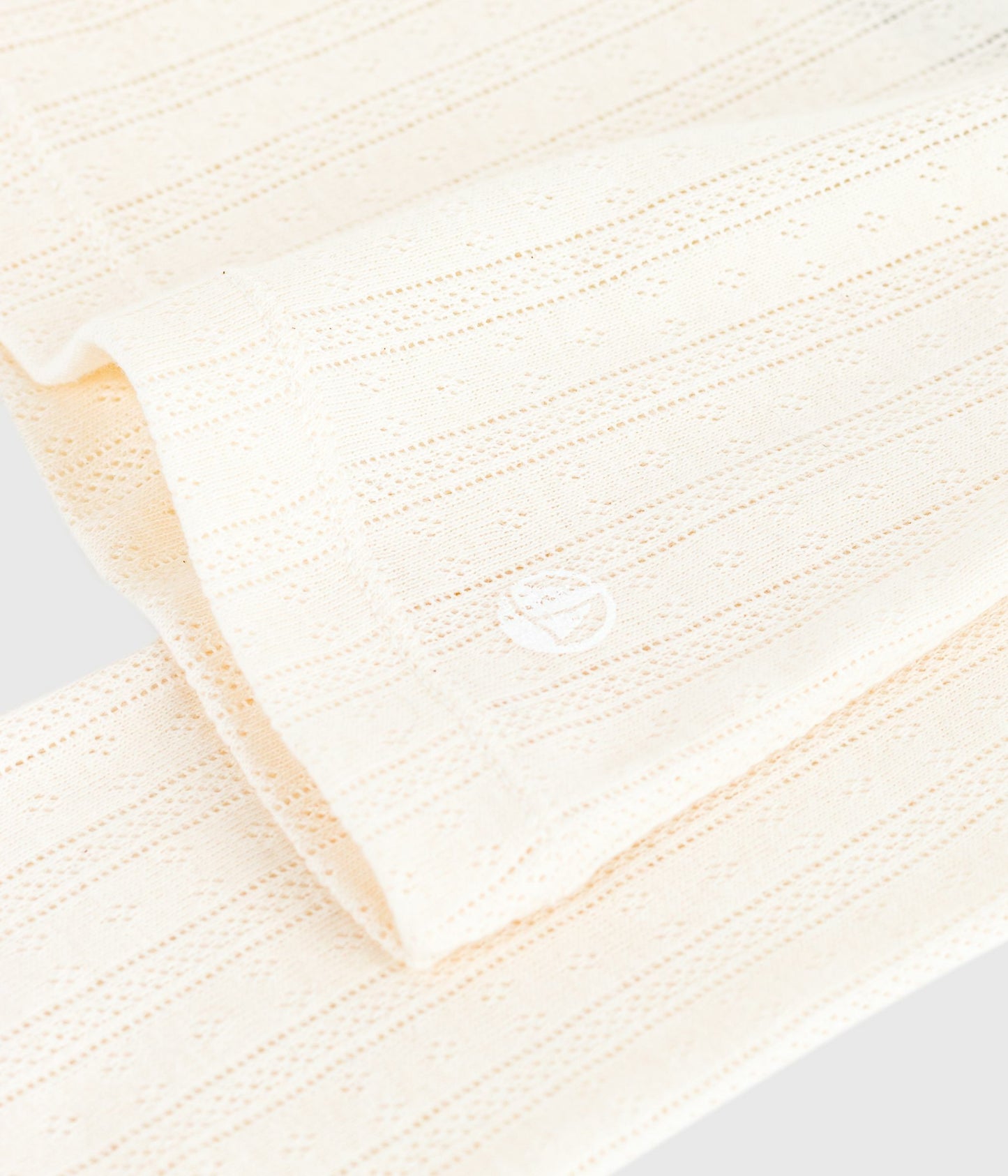 Langærmet t-shirt til kvinder i ensfarvet pointelle