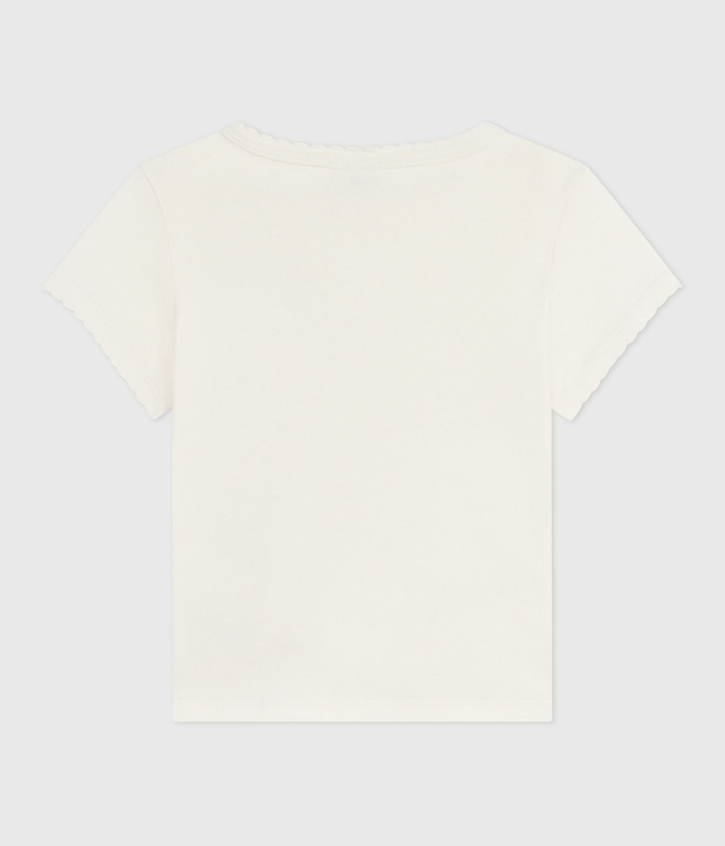 T-shirt i hvid bomuld med rødt hjerte på brystet