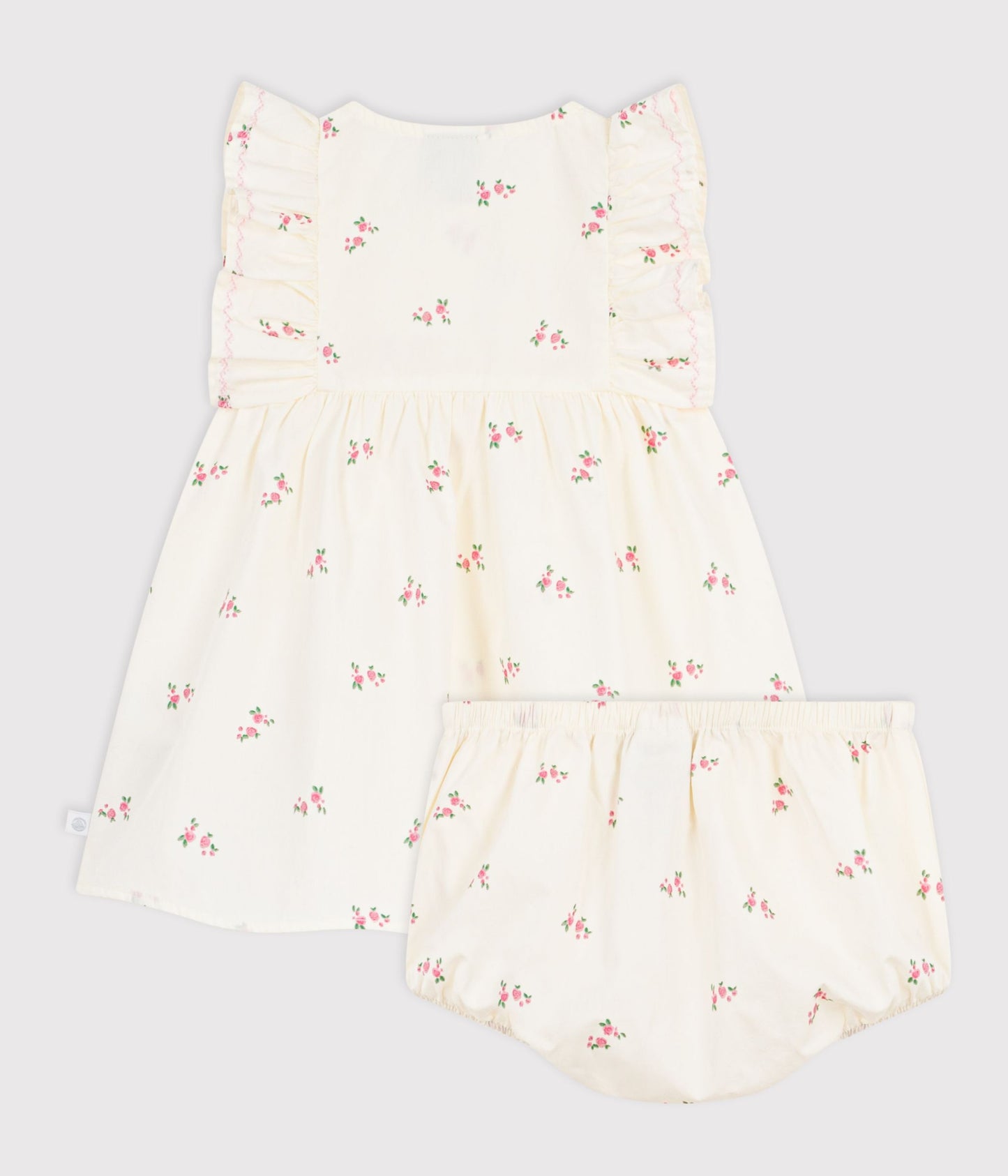Kjole med bloomers og blomstertryk til baby
