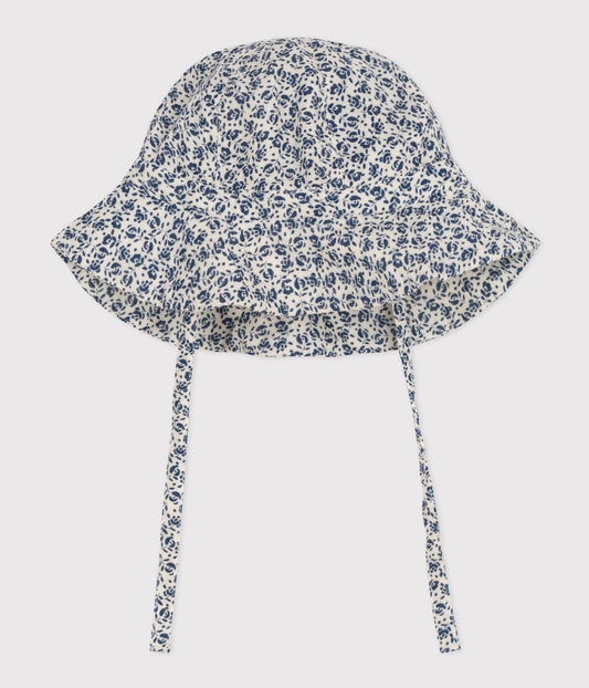 Solhat i bomuld med blå blomster til baby