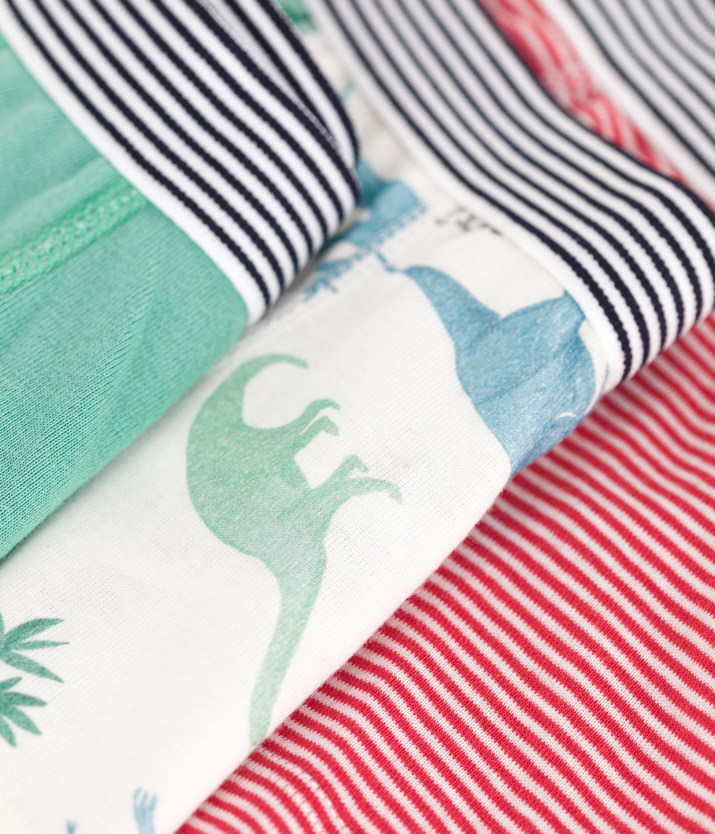 3-pak boxershorts i bomuld til drenge ensfarvet, røde striber og dinosaurprint