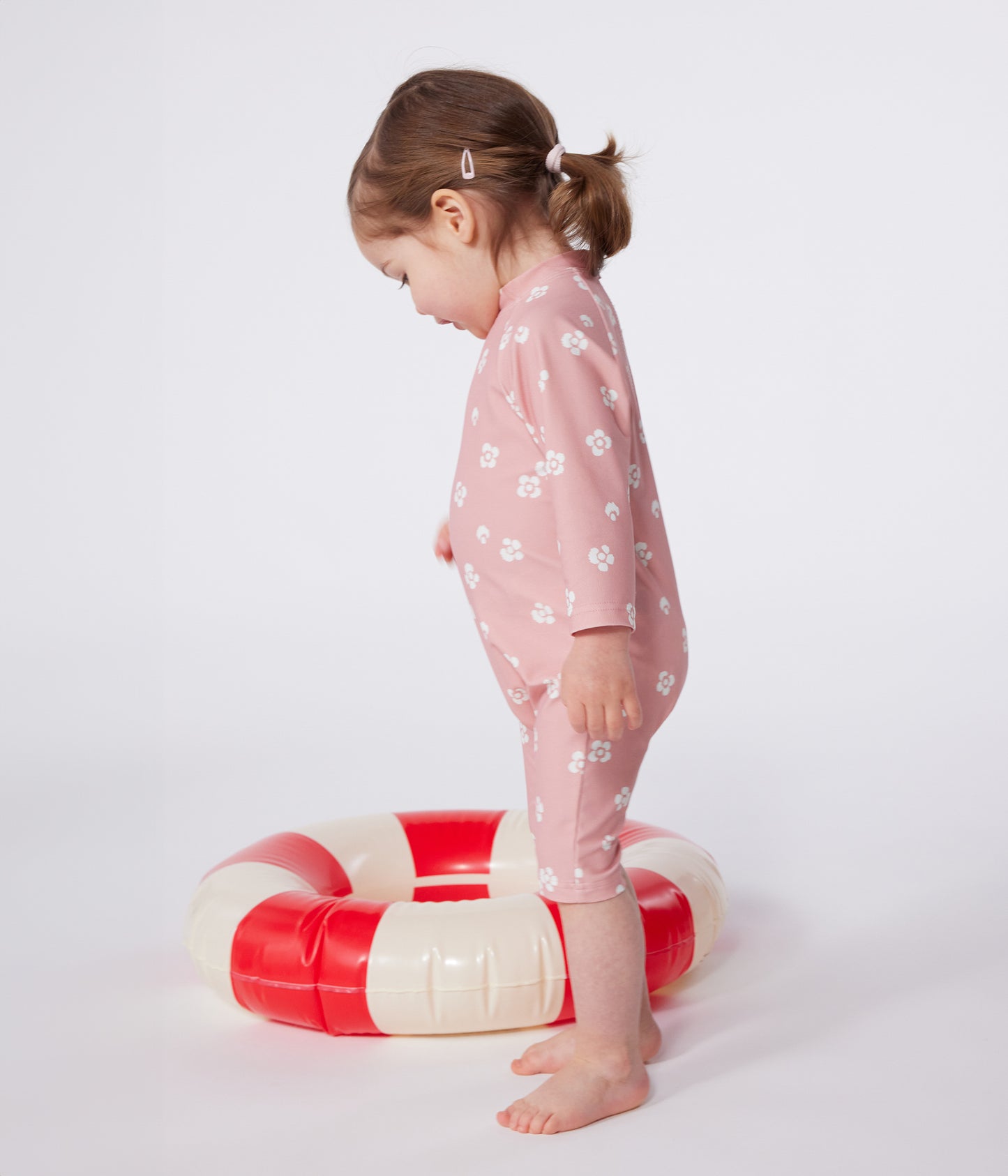 UV-beskyttende badedragt med blomsterprint til baby