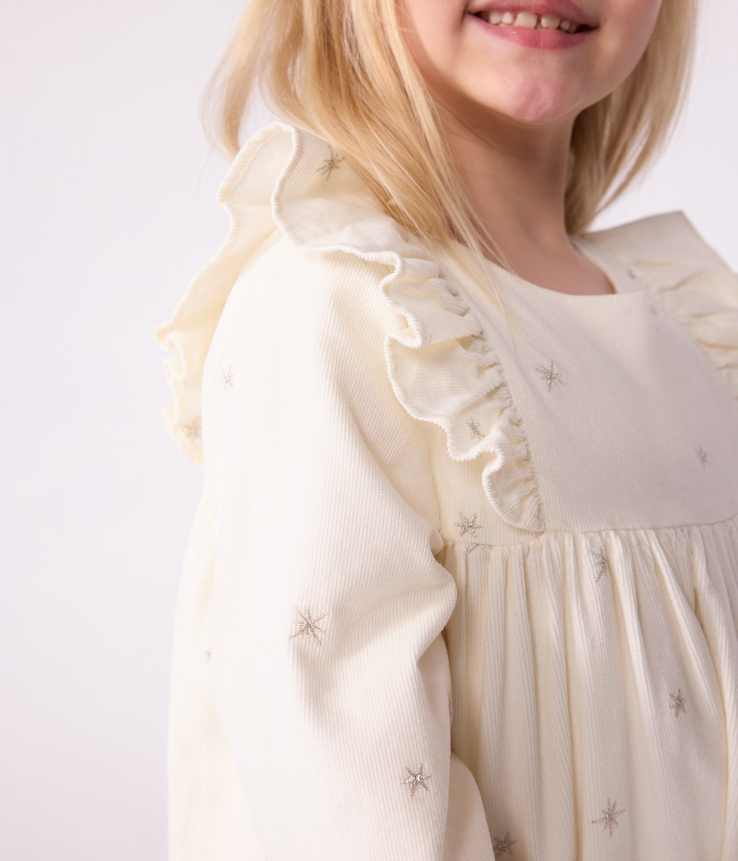 Fløjlskjole i råhvid med stjerner til piger