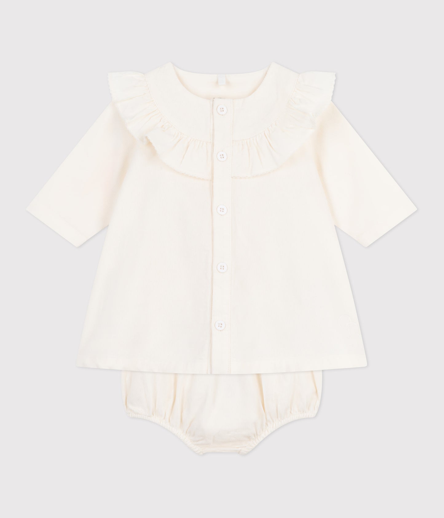 Råhvid fløjlskjole med broderet logo til baby