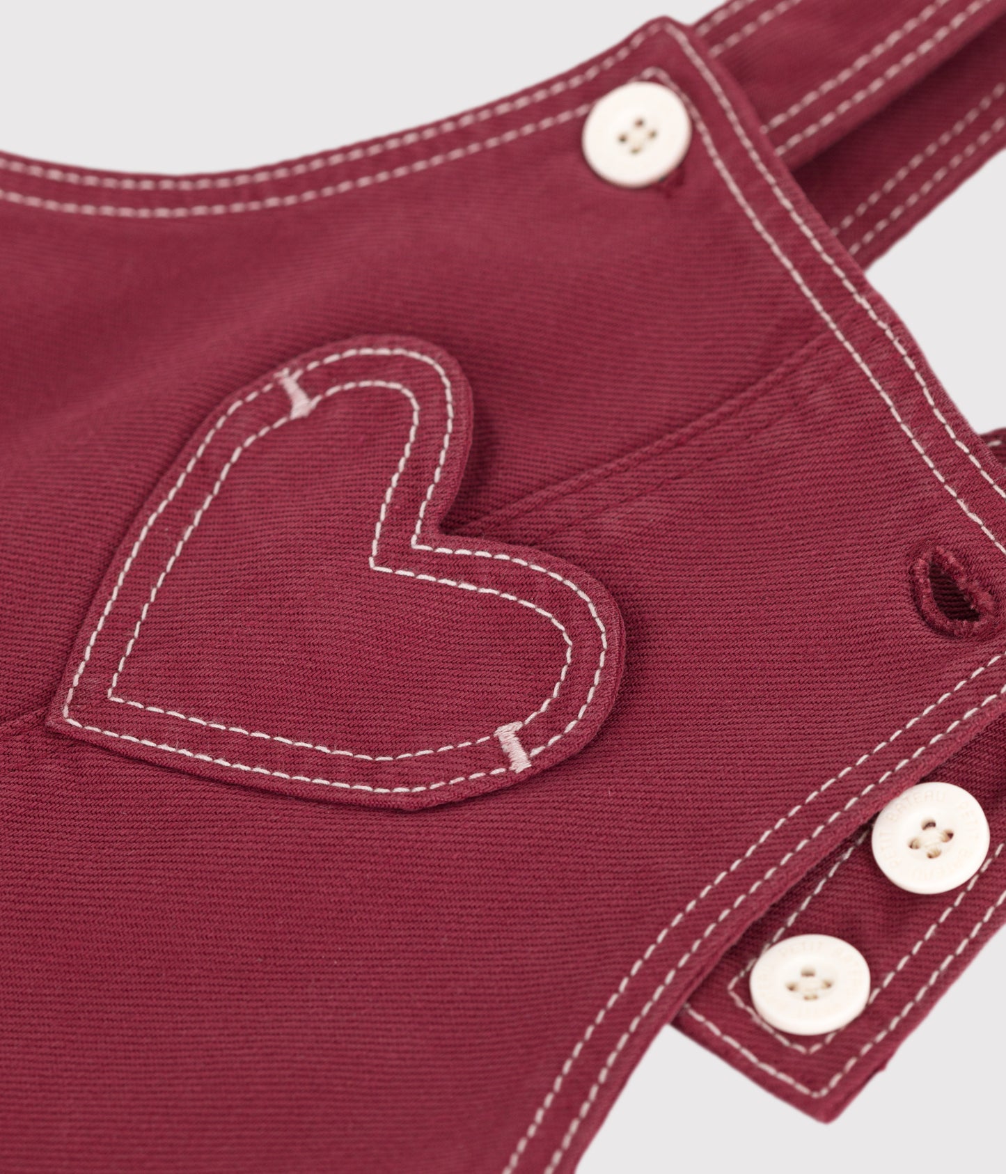 Overalls i rød denim til baby