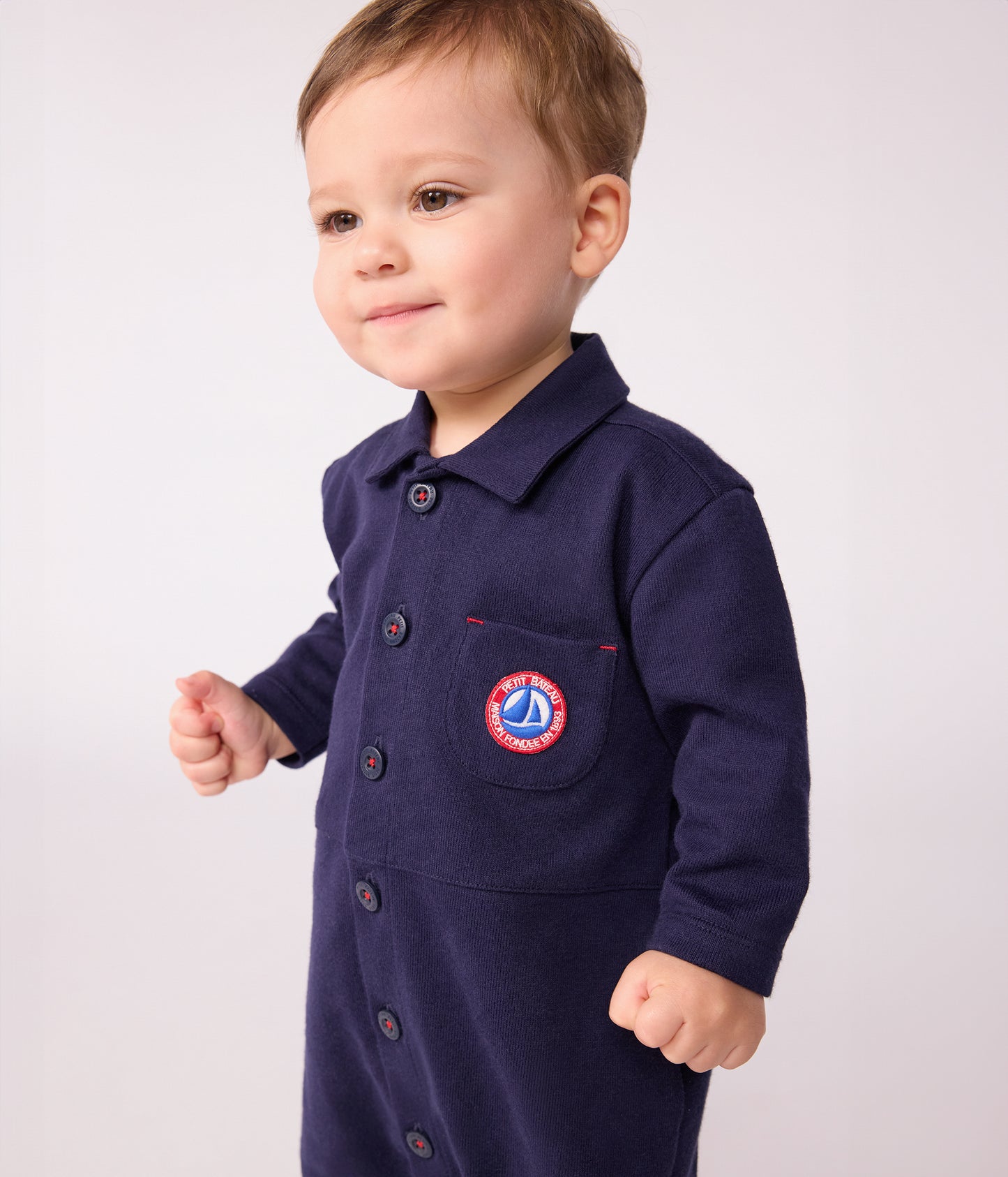 Overalls-inspireret buksedragt i mørkeblå til baby