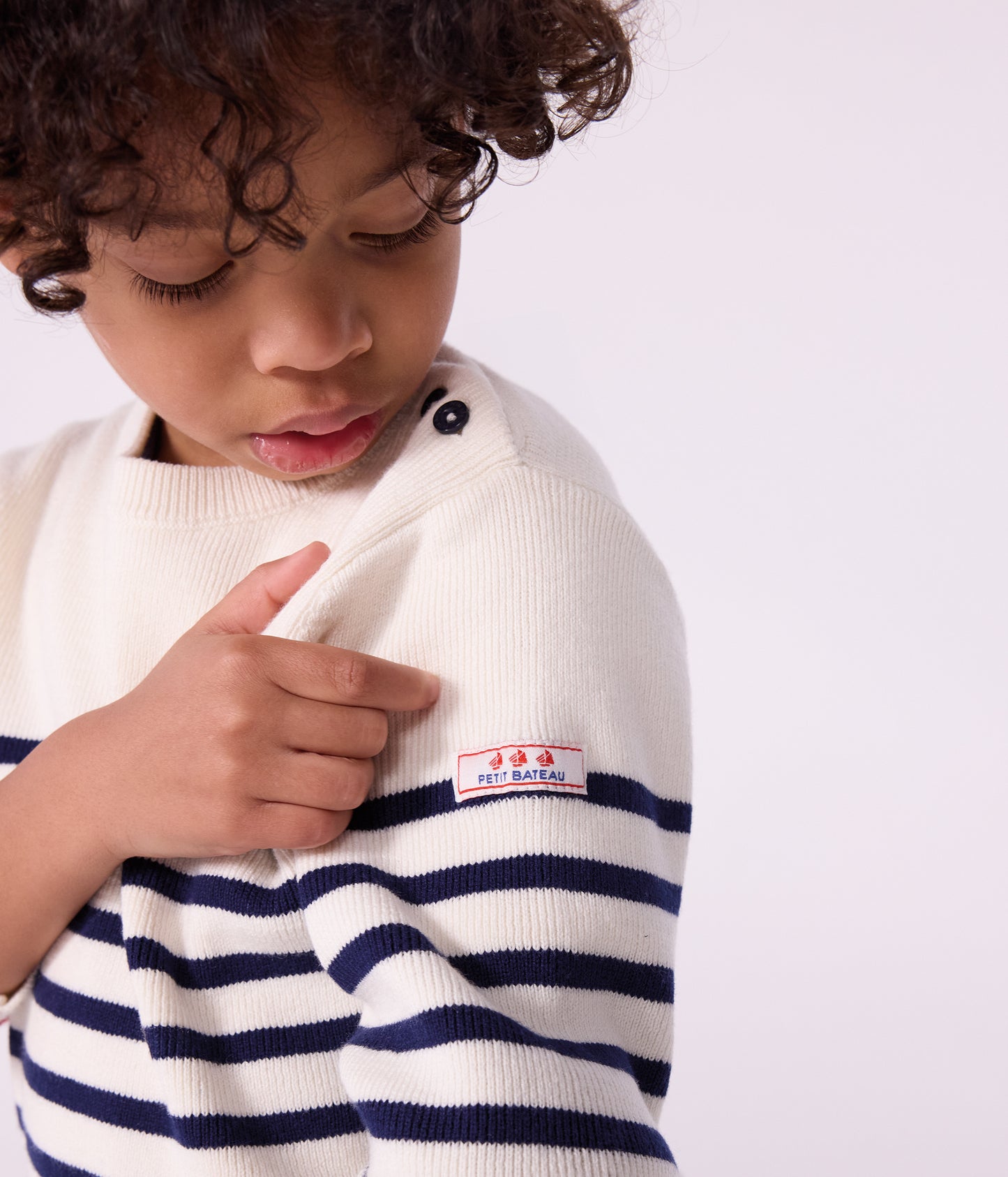 Stribet sweater til børn i uld og bomuld