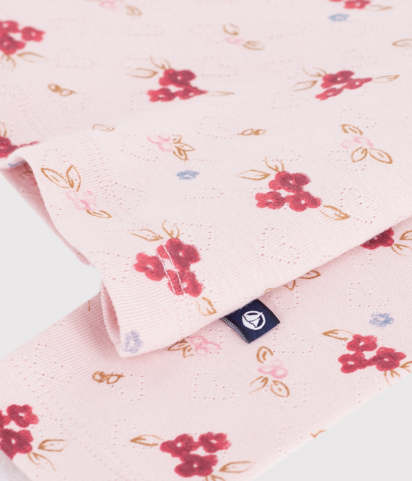 Rullekrave i lyserød med blomsterprint