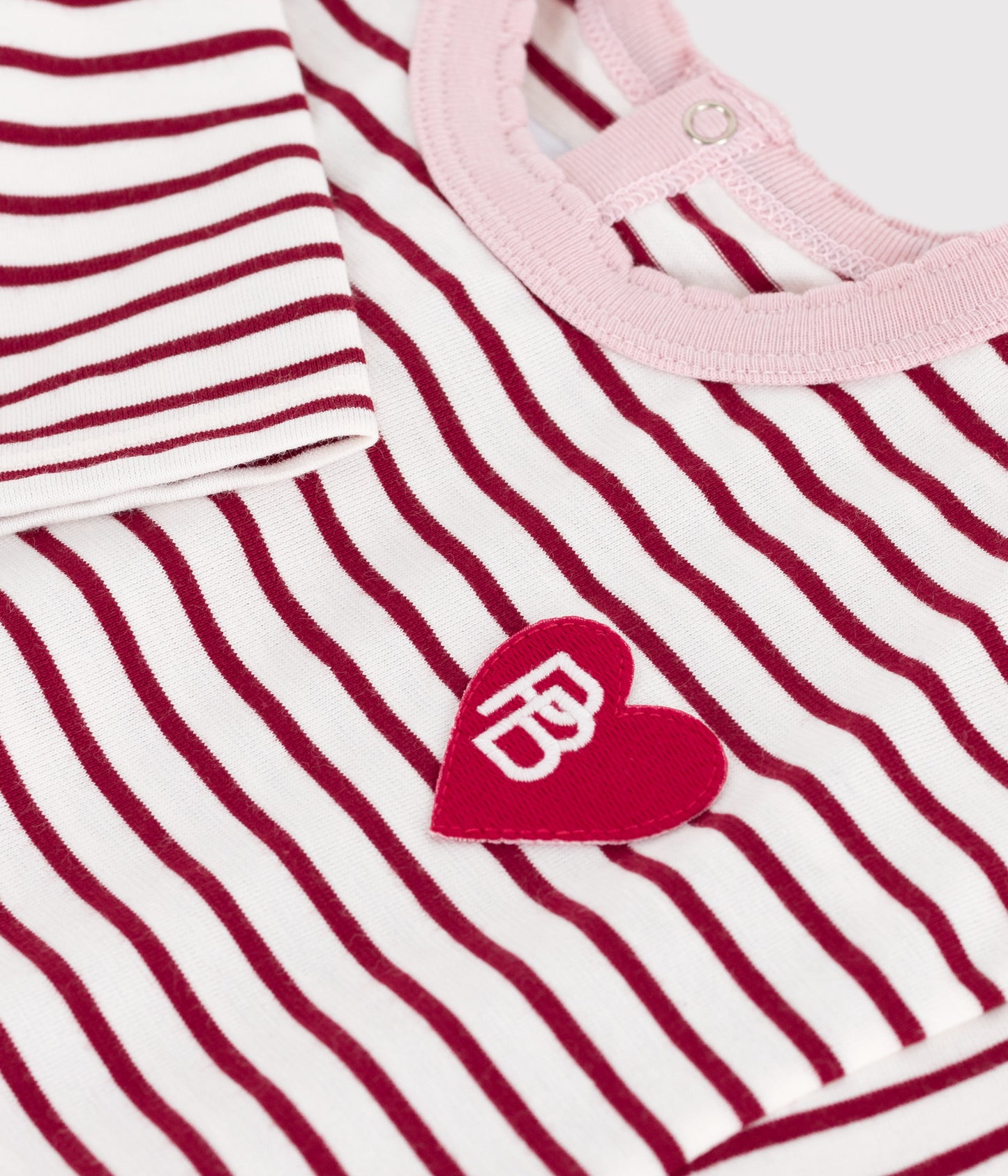 Langærmet t-shirt med røde/lyserøde striber til baby