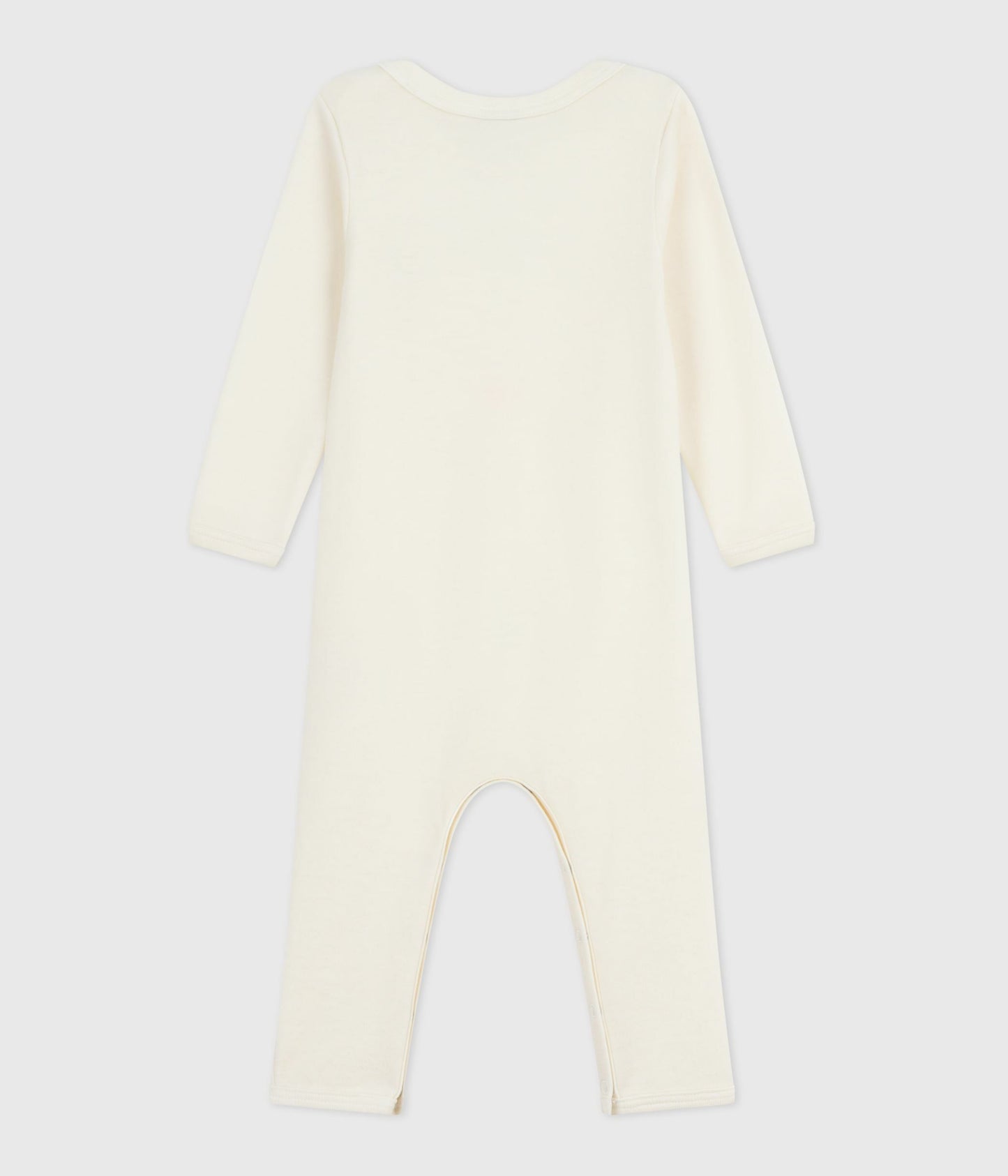 Heldragt i råhvid uld til baby