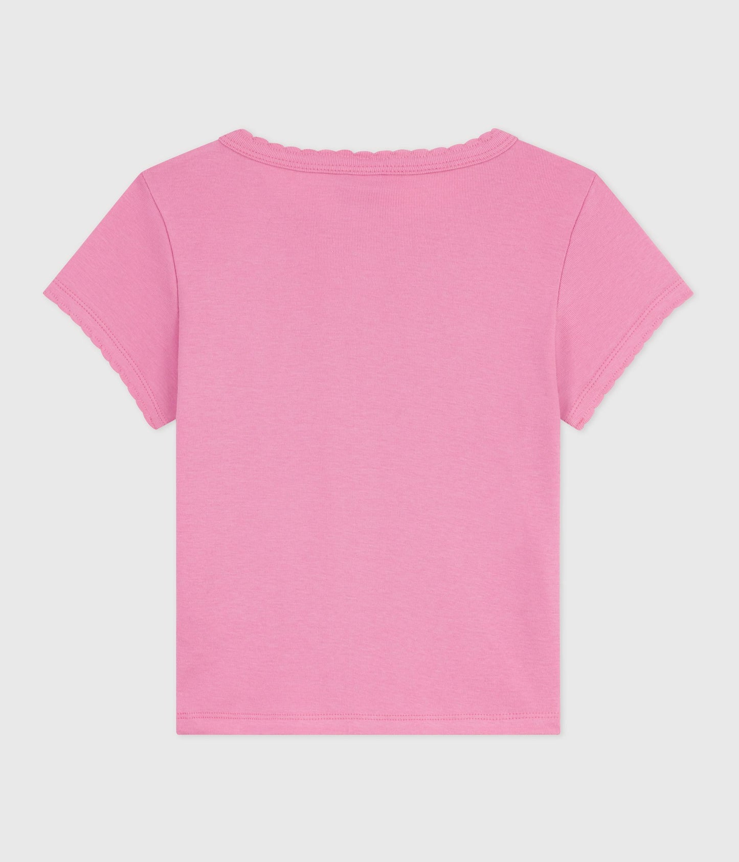 T-shirt i lyserød bomuld med bølgekant og hvidt logo