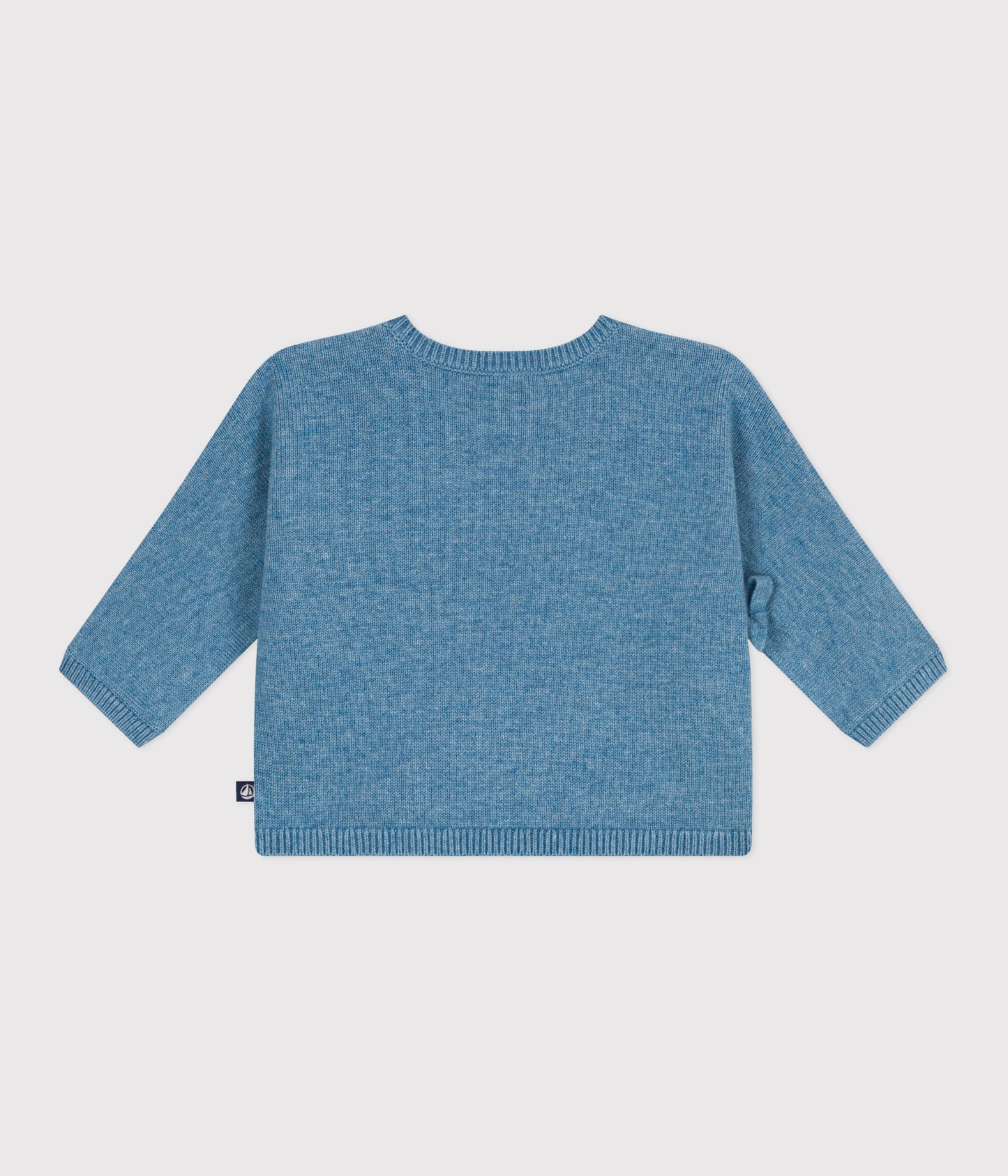 Hulmønsteret cardigan i uld og bomuld til baby med krydslukning - blå