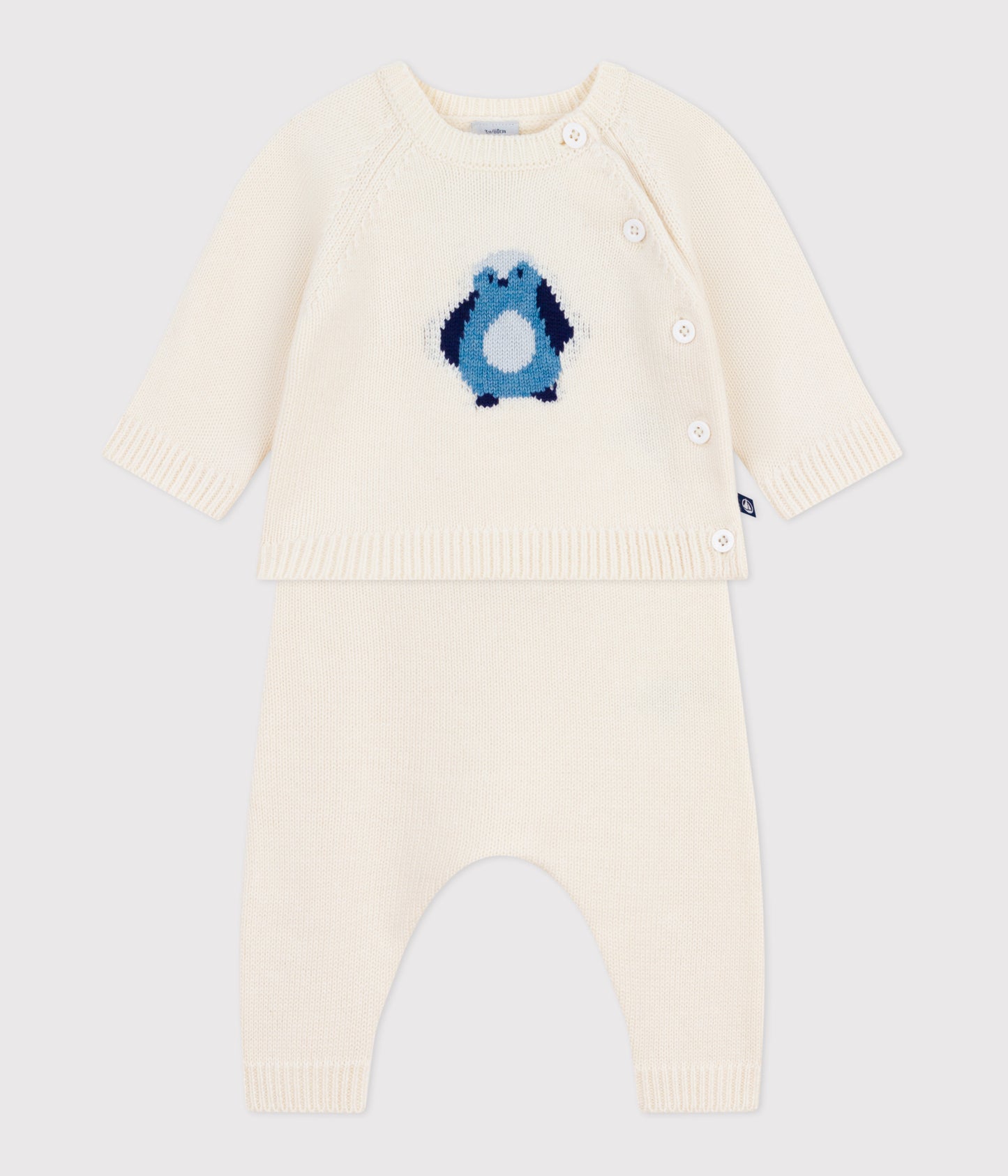 To-delt strikket sæt til baby med blå pingvin