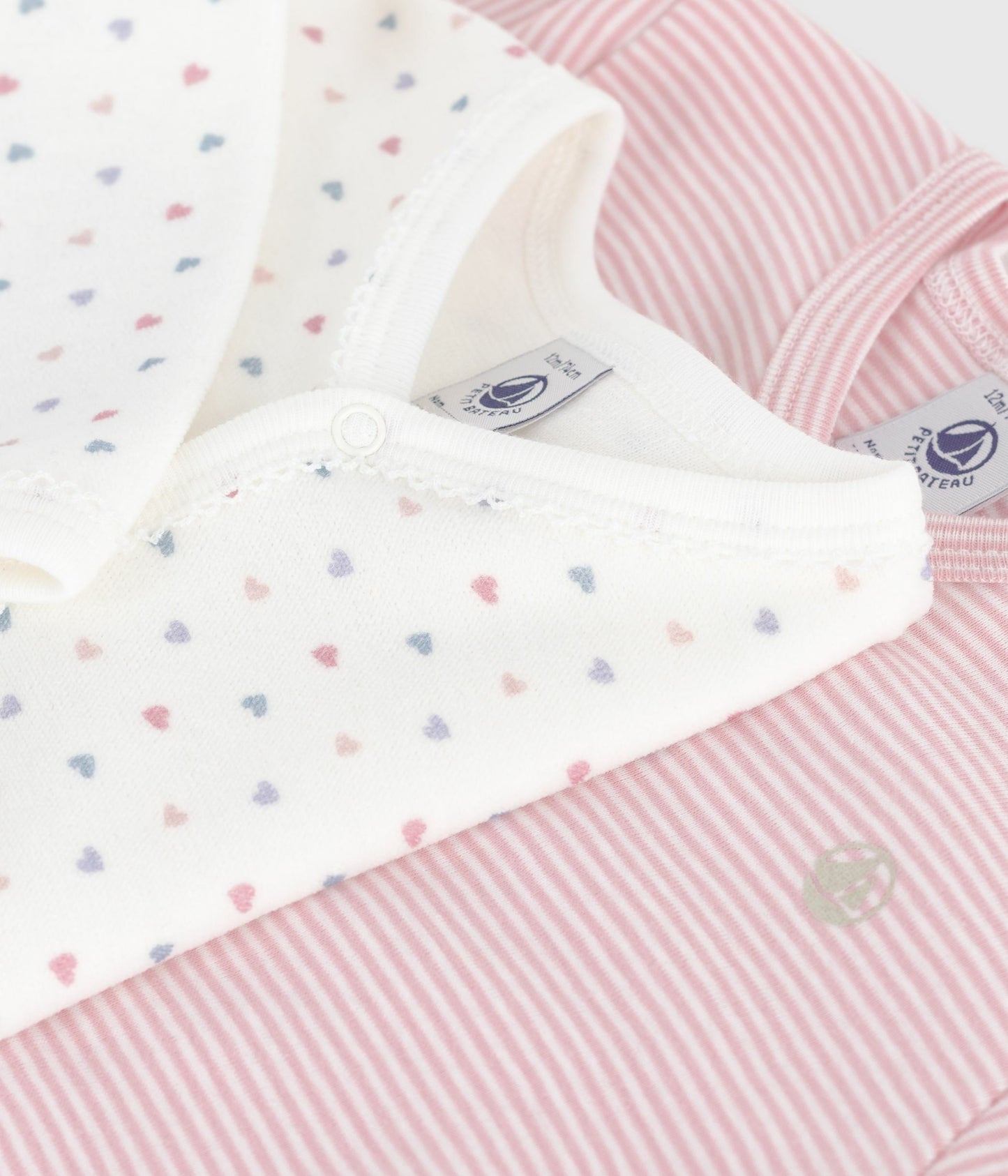 2-pak pyjamas til baby med lyserøde striber og hjerter