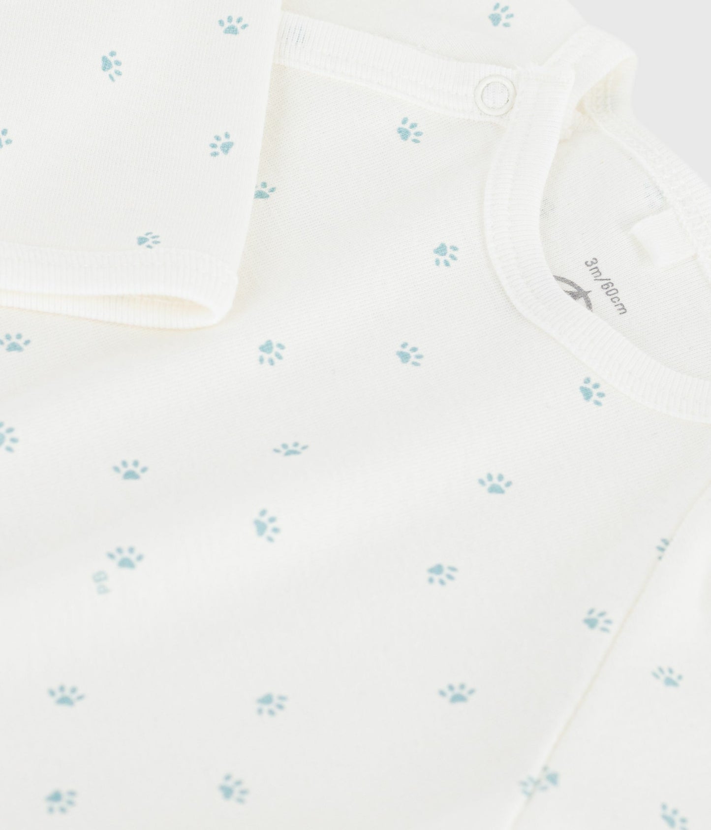 Pyjamas med fødder og små poter