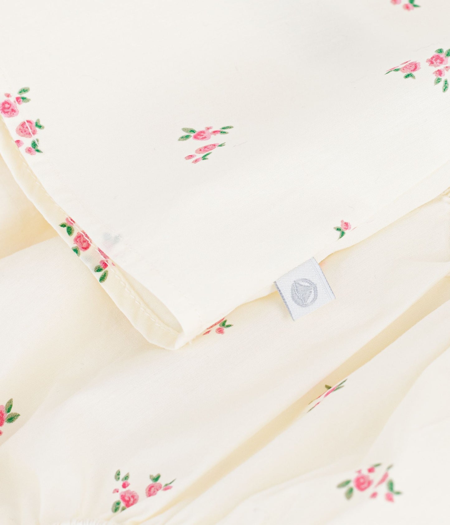 Kjole med bloomers og blomstertryk til baby