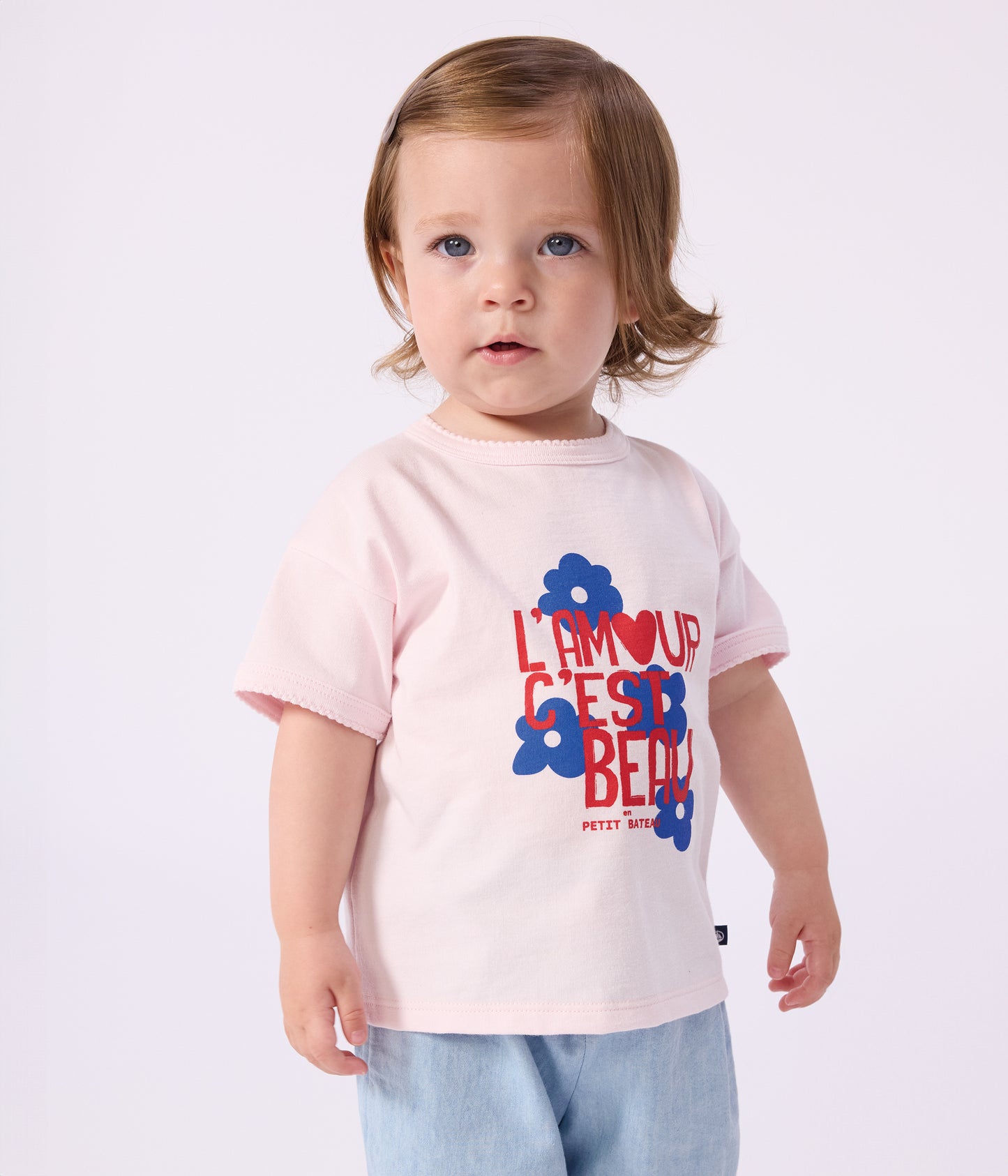 T-shirt til baby i lyserød med rød/blå motiv