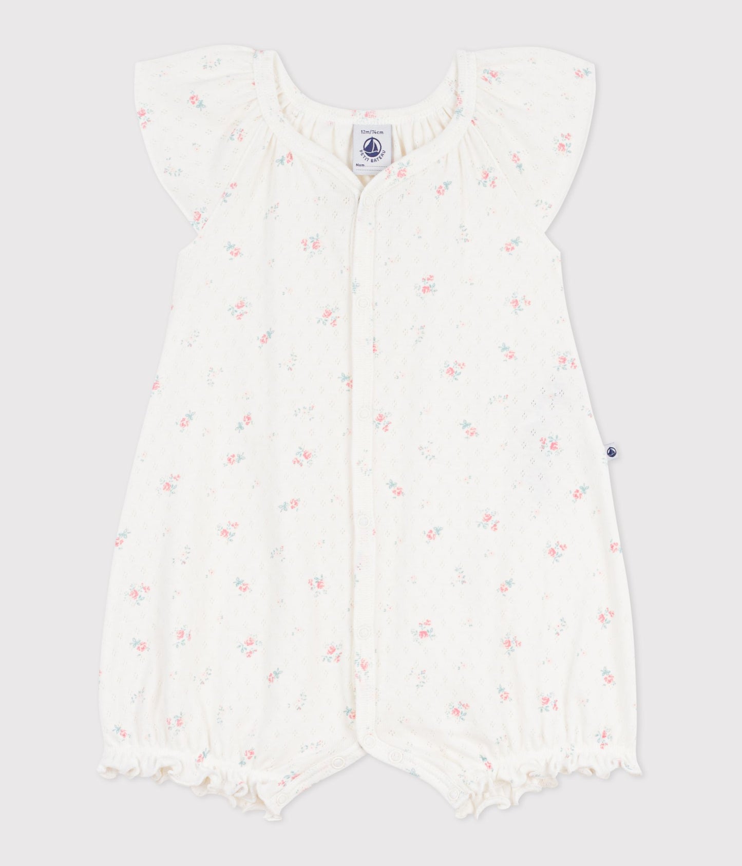 Kort blomstret sparkedragt til baby - pointelle m/blomster