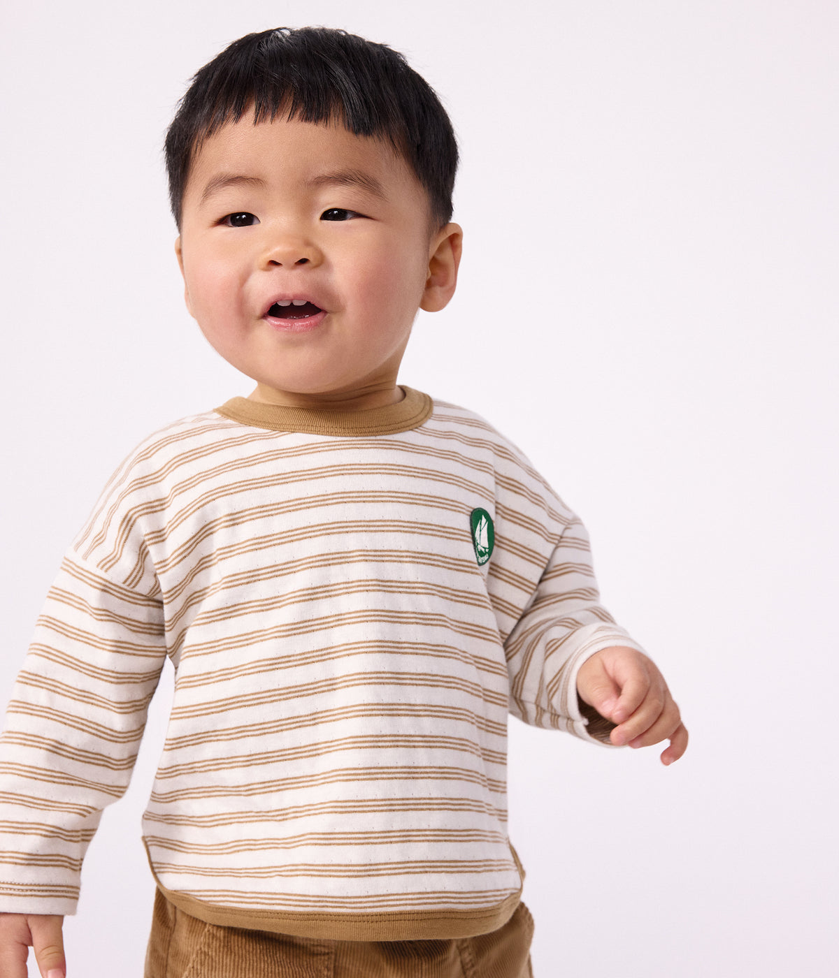 Langærmet stribet t-shirt til baby - LATTE/MILK